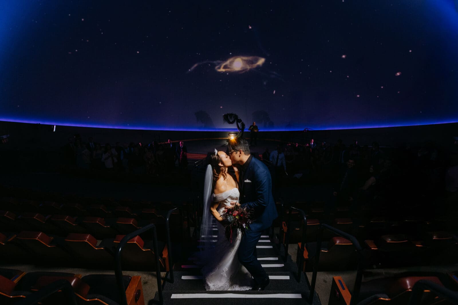 Bride and Groom Kissing at Chabot Space and Science Center on Wedding Day