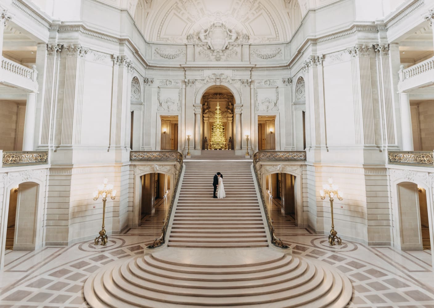 Couple on Grand staircase at San Francisco SF City Hall Wedding