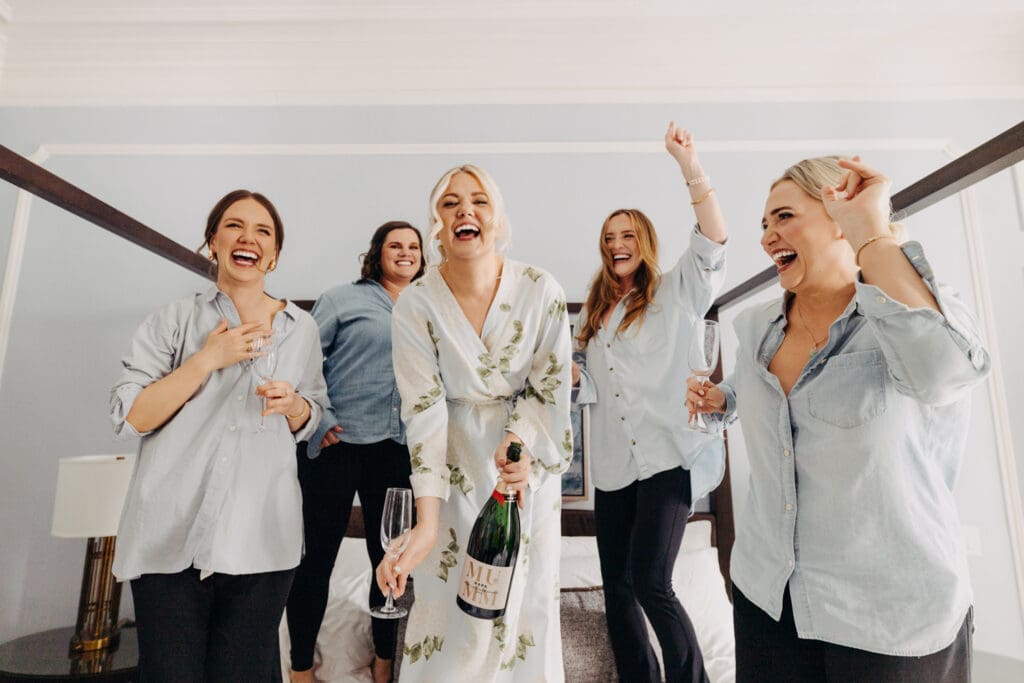 Bride and bridesmaids getting ready and having fun for the wedding day at the Palace Hotel San Francisco