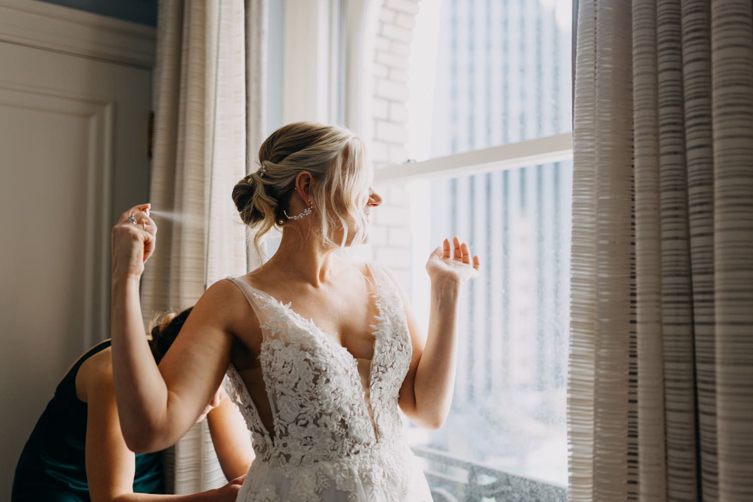 Bride getting ready in hotel suite at the Palace Hotel San Francisco wedding