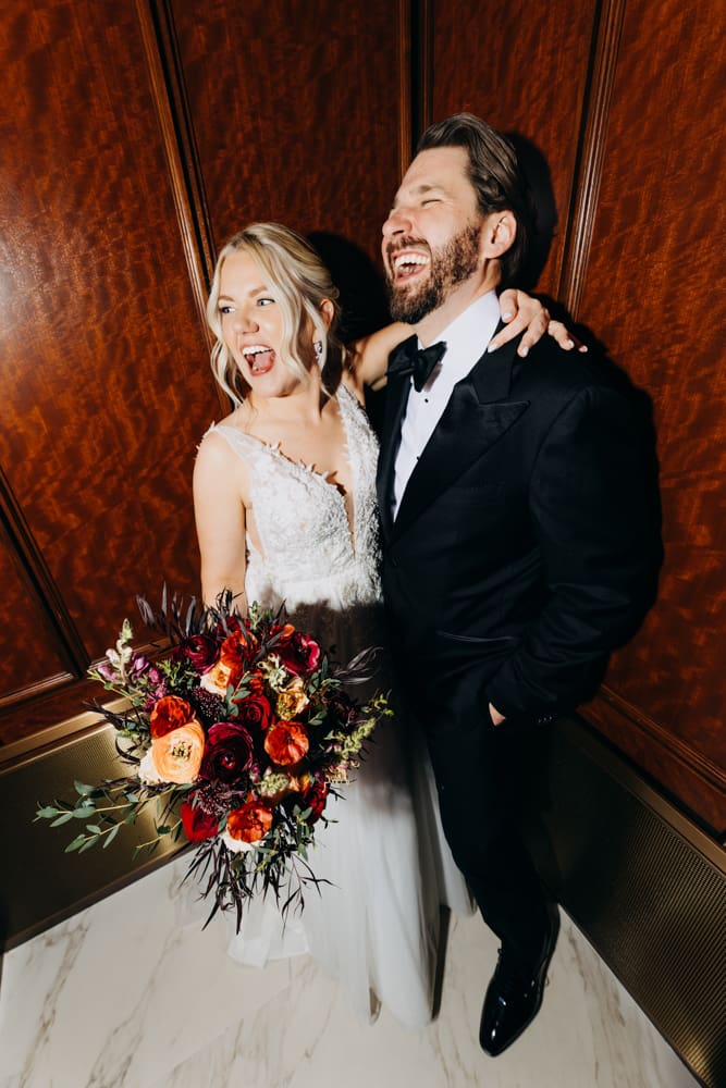 Bride and groom portrait inside historic elevators at the Palace Hotel San Francisco