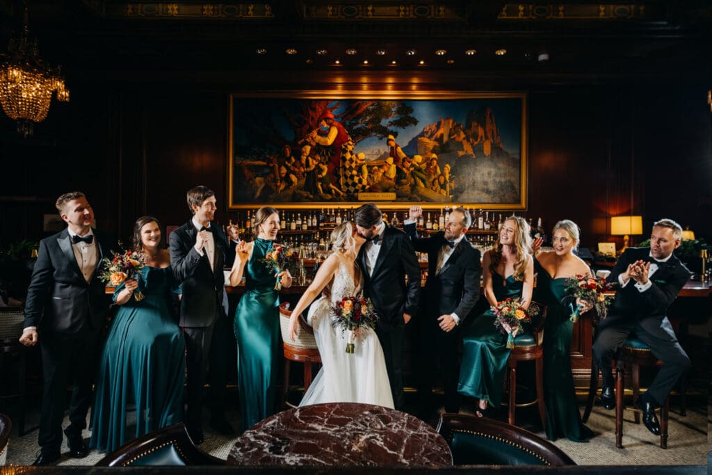 Wedding party portrait inside the Pied Piper Bar at the Palace Hotel San Francisco