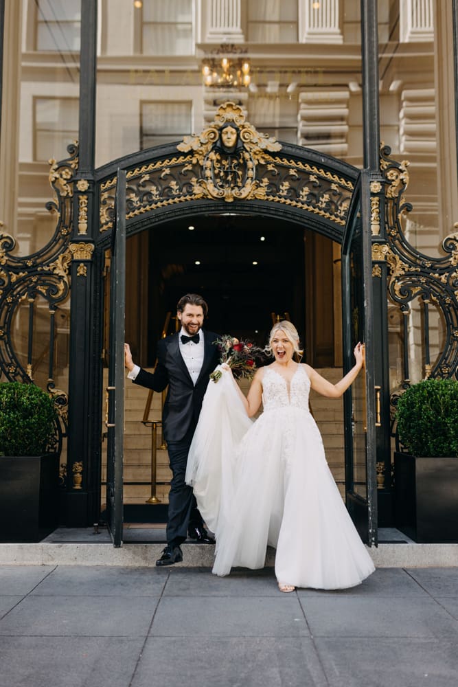 Wedding portrait in front of the historic Palace Hotel San Francisco doorway