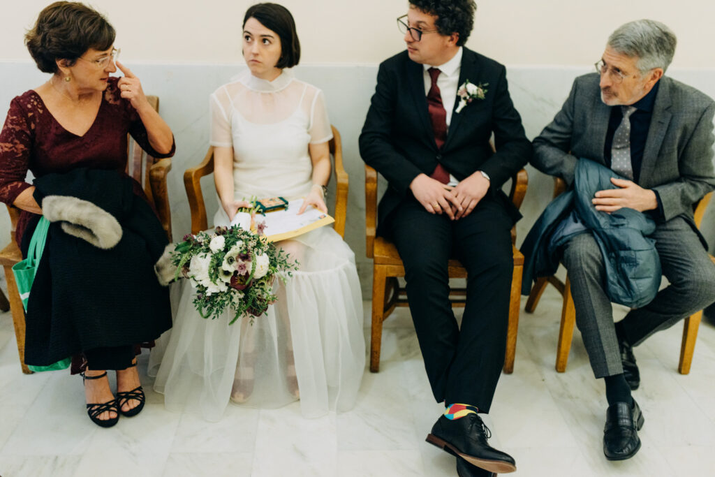 intimate family moment while waiting inside San Francisco City Hall