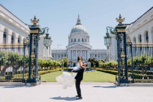 portrait at gates near City Hall San Francisco wedding