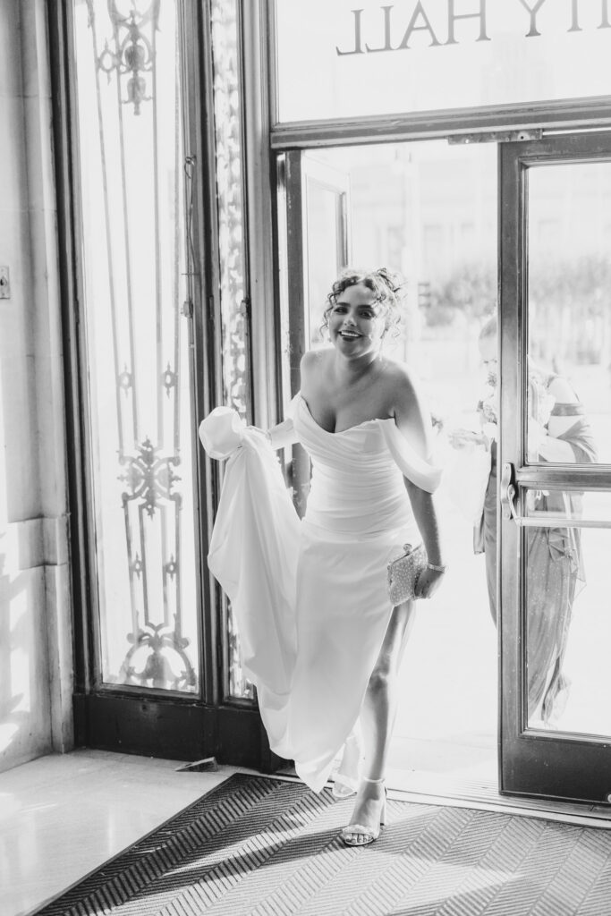 bride arriving at San Francisco City Hall wedding entrance