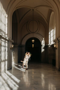 couple portrait fourth floor City Hall natural hard dramatic light