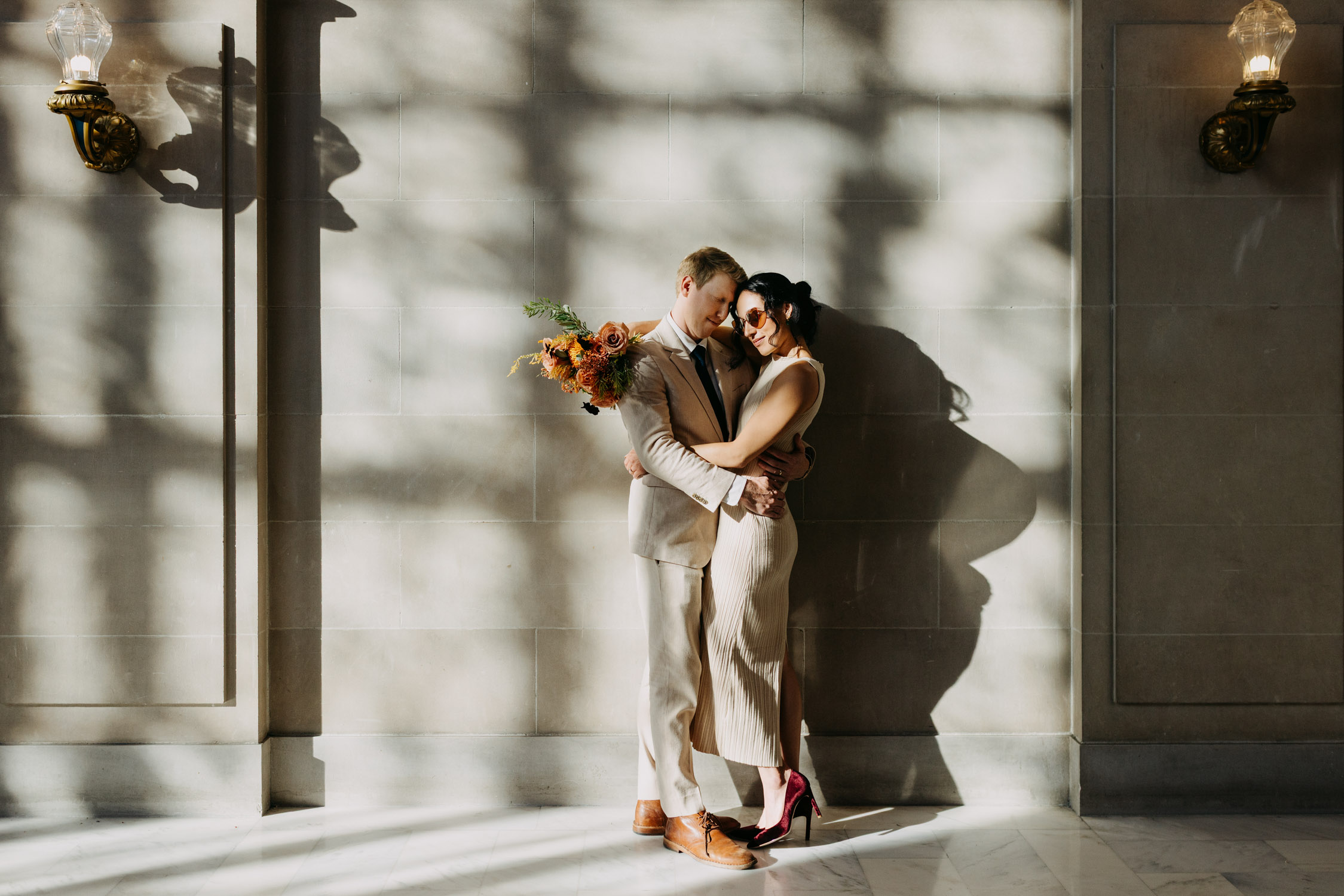 couple portrait fourth floor City Hall natural hard dramatic light