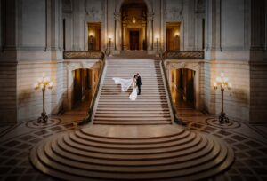 portrait on grand staircase San Francisco City Hall