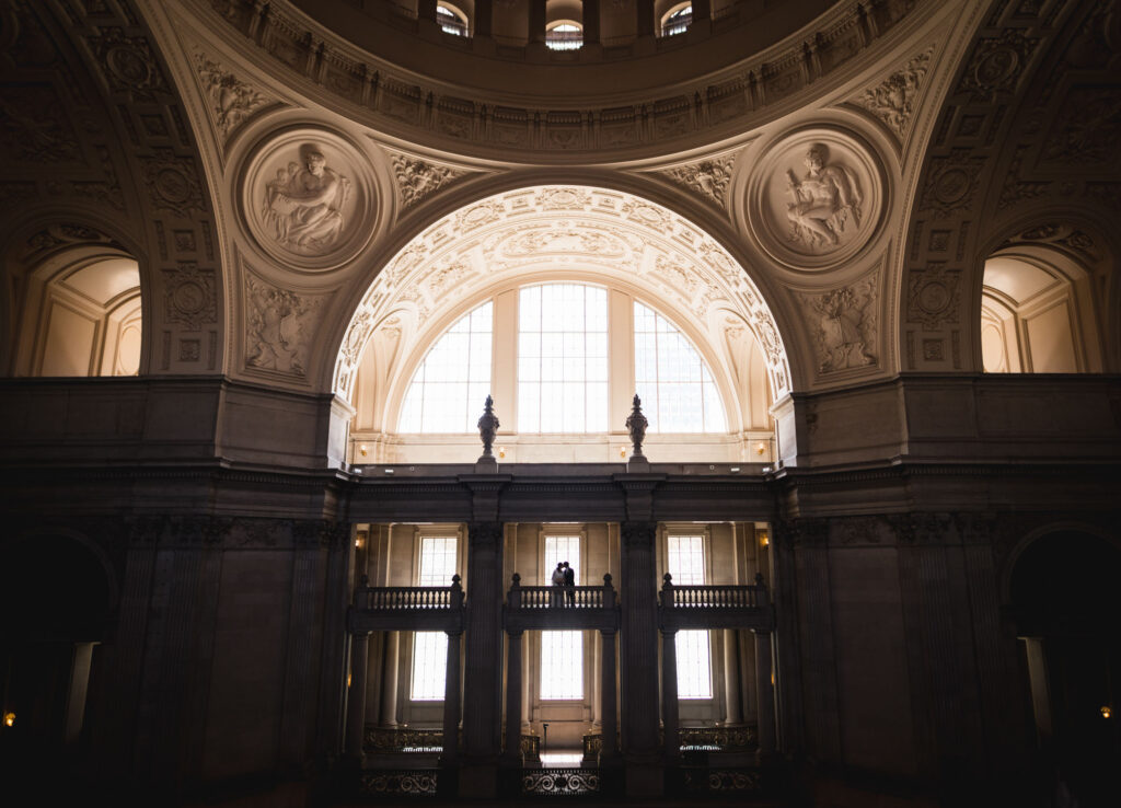 San Francisco City Hall wedding photo taken across the courtyard