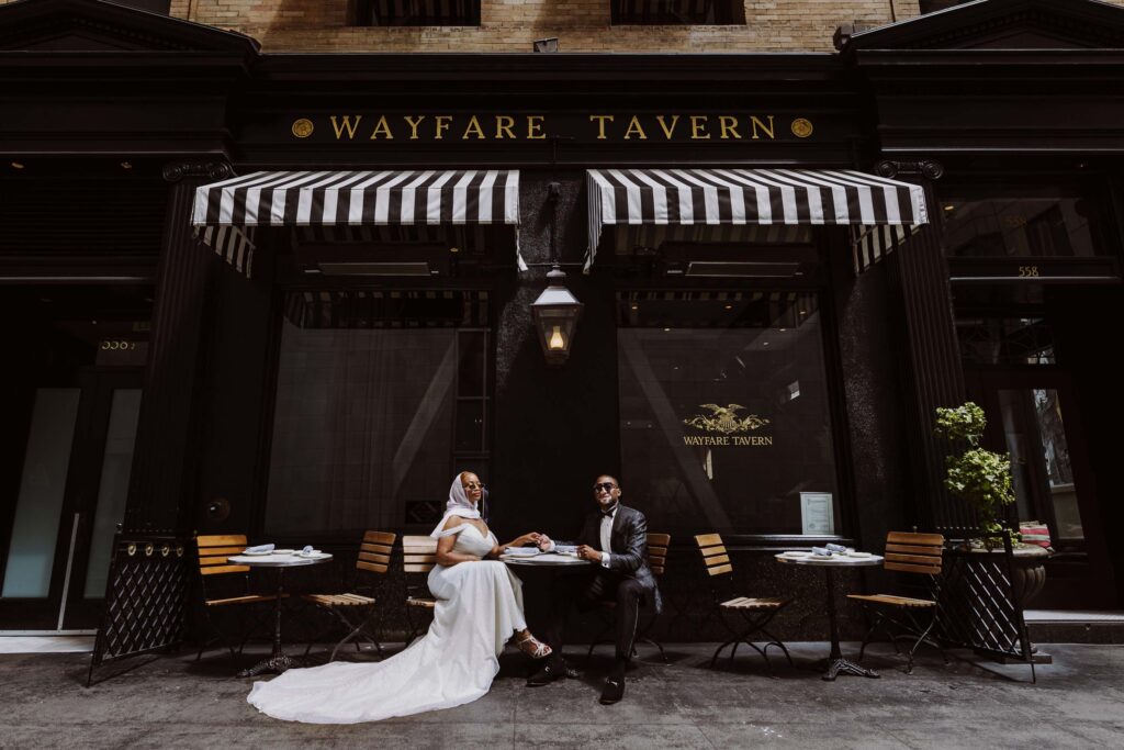 Black couple at Wayfare Tavern having Beyonce and JayZ moment after their San Francisco City Hall wedding ceremony