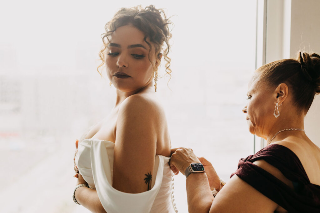 Bride and mom getting ready at hotel prior to City Hall Wedding Ceremony