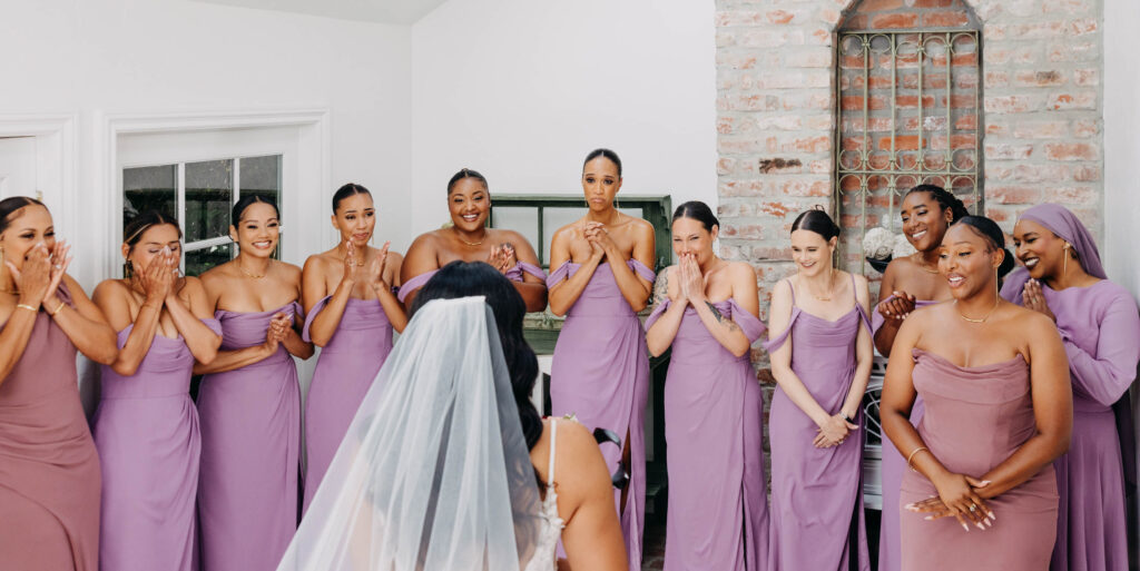 Bride and bridesmaids first look at Lavanda at Leal Vineyards