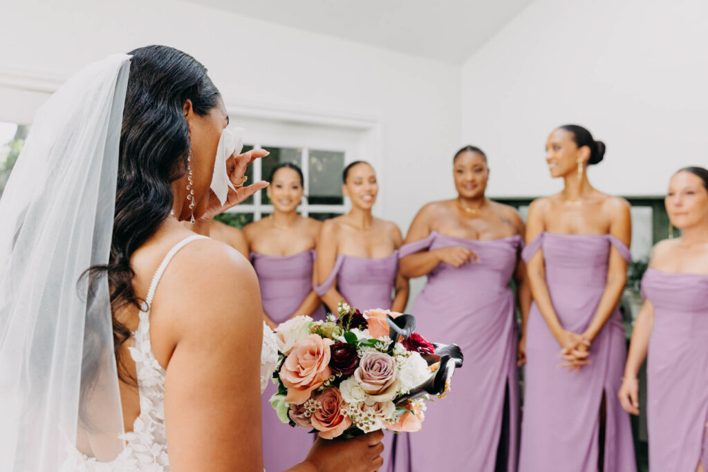 Bride and bridesmaids first look at Lavanda at Leal Vineyards