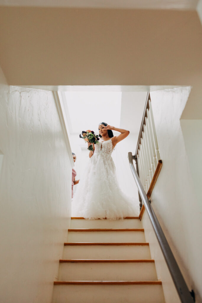 Bride standing at the top of the stairs at Lavanda Leal Vineyards